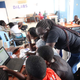 Mentors from LakeHub working with coding teams.